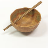 Wavy Noodle Bowl with Chopsticks